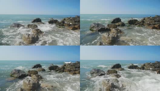 无尽的海浪拍打着岩石高清在线视频素材下载