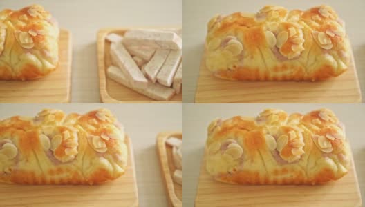 美味的芋头烤面包放在木板上高清在线视频素材下载