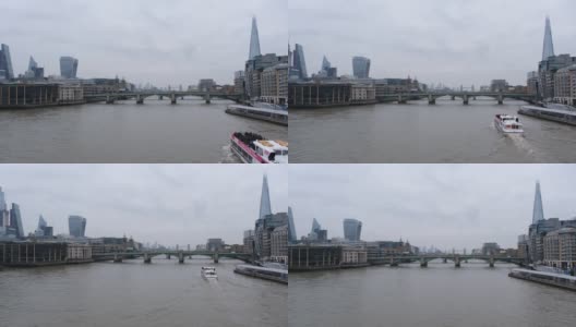 泰晤士河伦敦远处的标志性摩天大楼全景与塔桥。高清在线视频素材下载
