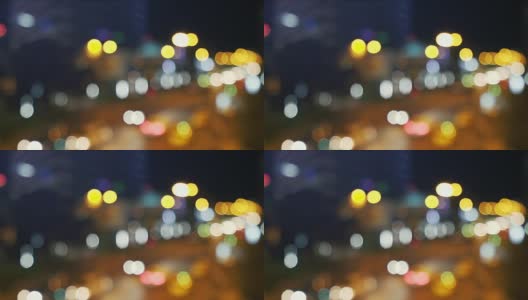 在夜晚散焦的城市背景。高清在线视频素材下载