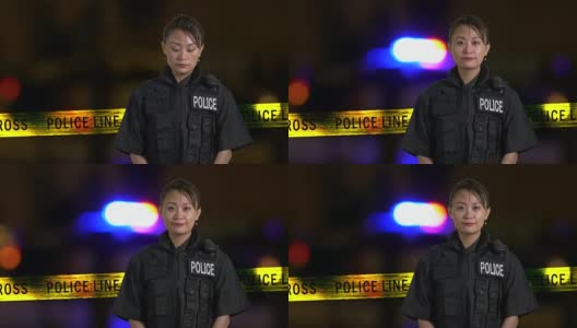亚裔美国女警察微笑着在犯罪现场与警报器的背景，垃圾摇滚的样子高清在线视频素材下载