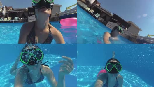 戴着面具的女孩在游泳池里看着镜头，冒着泡泡高清在线视频素材下载
