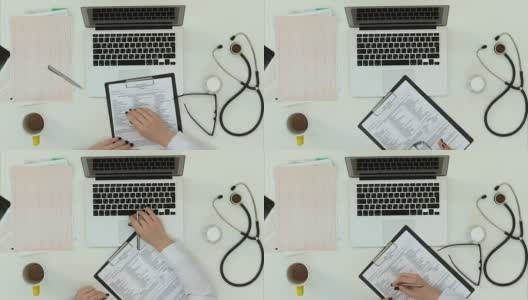 女医生填写表格，通过skype进行咨询高清在线视频素材下载