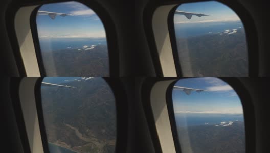 从飞机窗口眺望大海高清在线视频素材下载