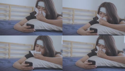 沮丧的女病人躺在床上打喷嚏高清在线视频素材下载