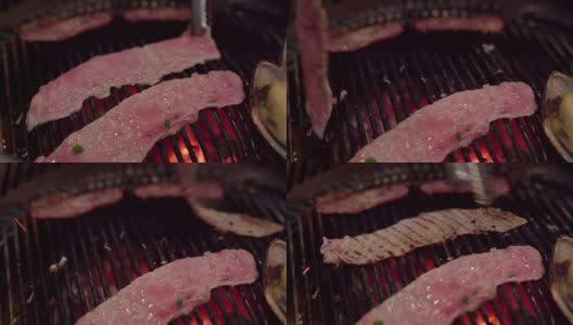 一盘牛肉和猪肉，配烧烤酱汁。烧烤yakiniku自助餐厅。高清在线视频素材下载