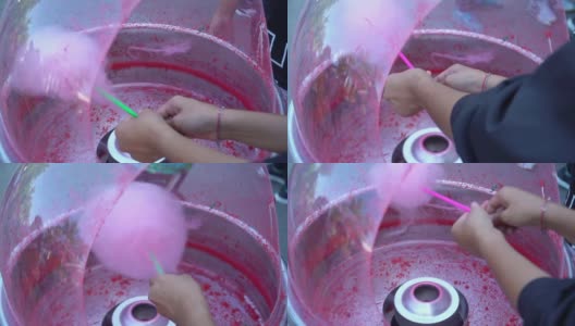 手持机器制作粉色棉花糖。高清在线视频素材下载