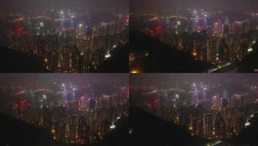 夜间照亮香港市景维多利亚山顶空中全景4k高清在线视频素材下载