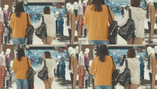 两个年轻女人在一家百货商店购物，慢镜头高清在线视频素材下载