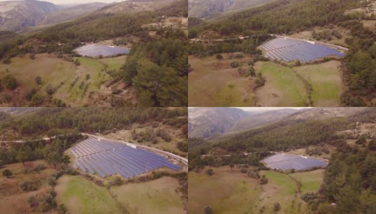 太阳能电池板或太阳能电池在太阳能农场在山区高清在线视频素材下载