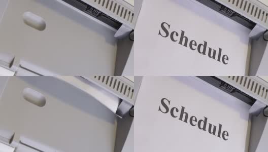 日程表，办公室打印机打印在一张白纸上，特写，俯视图，为日程表列表的启动屏幕布局。高清在线视频素材下载