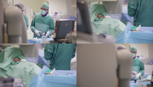 手术室里靠近手术台的两名医生高清在线视频素材下载
