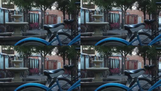 在饮水机旁停放自行车高清在线视频素材下载