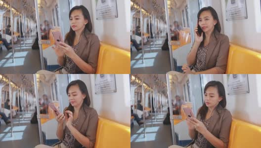 商务女性在城市火车上使用智能手机高清在线视频素材下载