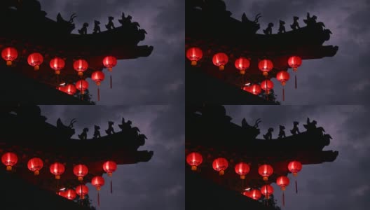 古老的传统寺庙晚上挂着圆圆的红灯笼高清在线视频素材下载