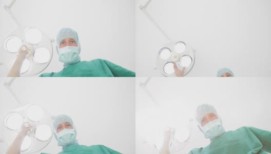 外科医生与手术光。高清在线视频素材下载