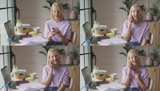 一个年轻女人在卧室里讲电话高清在线视频素材下载