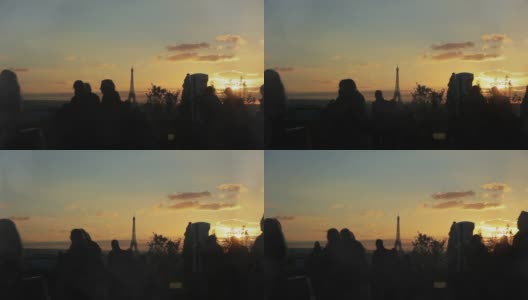 法国巴黎，人们在老佛爷画廊的屋顶欣赏日落。高清在线视频素材下载
