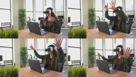 会议室里有个女人在用虚拟现实高清在线视频素材下载
