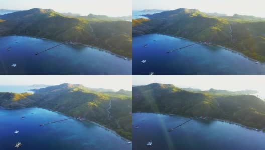 印度尼西亚巴厘岛附近的弗洛雷斯岛，纳万巴霍岛，碧海碧水的热带岛屿，鸟瞰图令人叹为观止。拍摄分辨率为4k高清在线视频素材下载