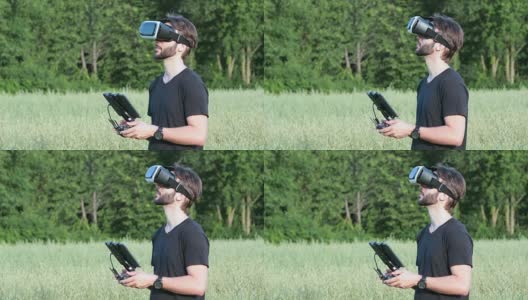 男子驾驶无人机与虚拟现实眼镜耳机高清在线视频素材下载