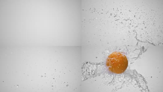 SLO MO Orange在空气中遇到水花高清在线视频素材下载