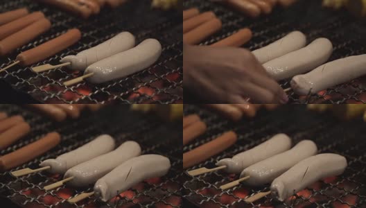 烤架上烤热狗的特写高清在线视频素材下载