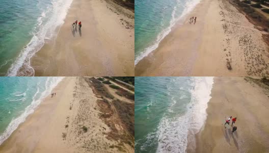 冲浪者沿着海滩行走4K高清在线视频素材下载