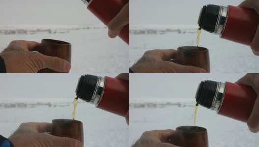 滑雪道上的热水瓶和小茶杯高清在线视频素材下载