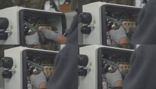 工人维修设备电工特写高清在线视频素材下载