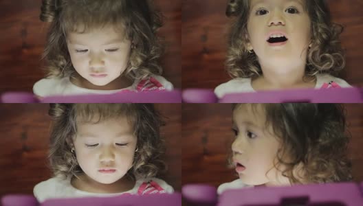 小女孩在玩电子平板电脑高清在线视频素材下载