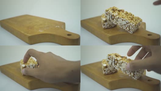 在白色背景的木板上，面包和泡芙米饭的镜头。高清在线视频素材下载
