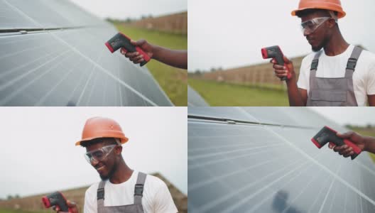 男性手持电子热成像仪近太阳电池户外的特写。太阳能农场的技术员在头盔上使用热成像仪。工程师统一测量太阳能电池板的温度高清在线视频素材下载
