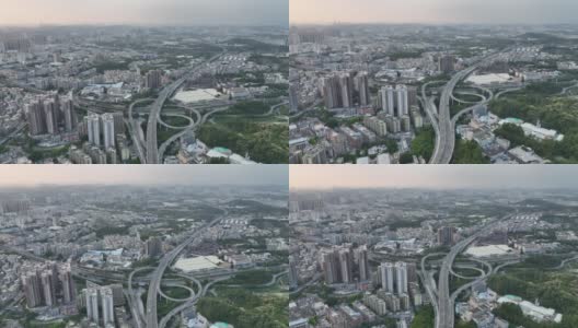 具有立交桥的现代城市建筑的航拍镜头在深圳，中国高清在线视频素材下载