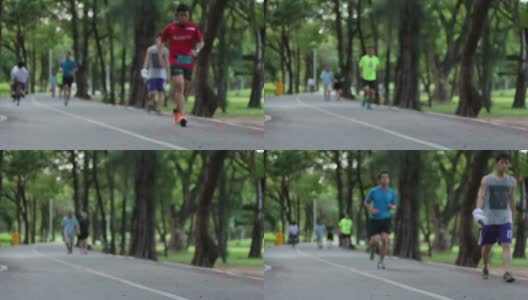 慢跑者，骑自行车的人在中央公园的自行车道上高清在线视频素材下载