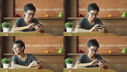 亚洲男人在用智能手机或平板电脑等人高清在线视频素材下载