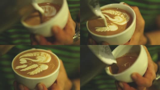 HD:拿铁艺术，咖啡师倒牛奶。高清在线视频素材下载