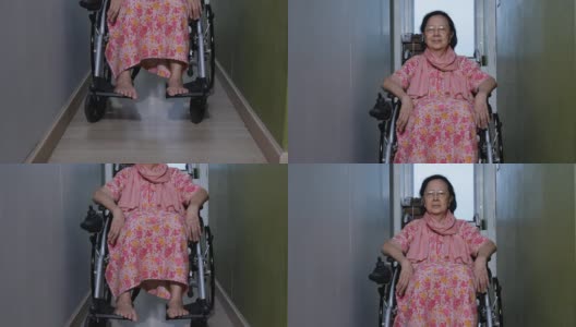 坐在轮椅上的亚裔老年妇女高清在线视频素材下载