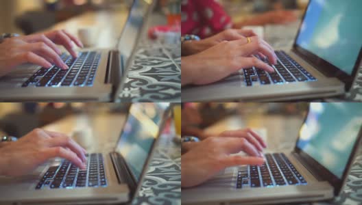 女人在笔记本电脑键盘上打字的特写，多莉拍摄高清在线视频素材下载