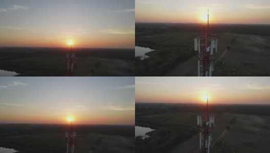电信塔鸟瞰图，夕阳下天线。高清在线视频素材下载