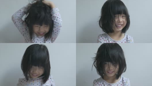 一个中国小女孩做鬼脸的特写高清在线视频素材下载