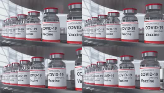 制药行业循环输送线上的COVID-19疫苗瓶高清在线视频素材下载