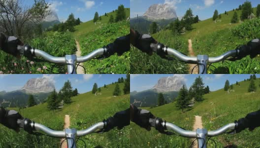 POV骑自行车下山的高山小径高清在线视频素材下载