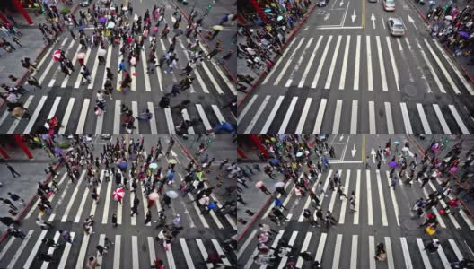 中国台北，2015年12月1日:台湾市中心行人过马路的鸟瞰图，高清在线视频素材下载