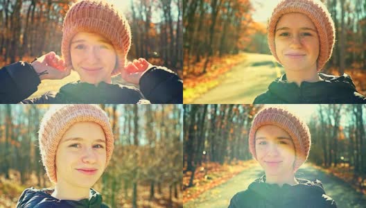 16岁的漂亮女孩秋天在户外散步的视频肖像高清在线视频素材下载