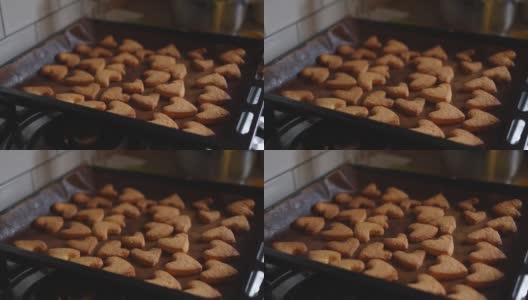 新鲜出炉的情人节心形饼干在平底锅烤箱高清在线视频素材下载