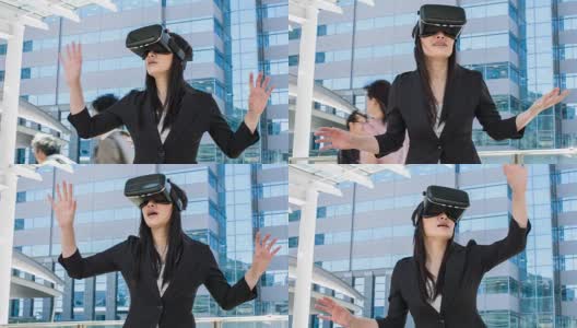 日本女商人在街上使用虚拟现实模拟器高清在线视频素材下载