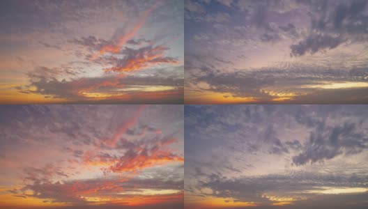 日落天空的时间流逝。抽象的自然背景。在黄昏的时候，蔚蓝色和橙色的云彩。高清在线视频素材下载