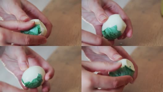 清洗一个彩色的煮鸡蛋。复活节的象征高清在线视频素材下载