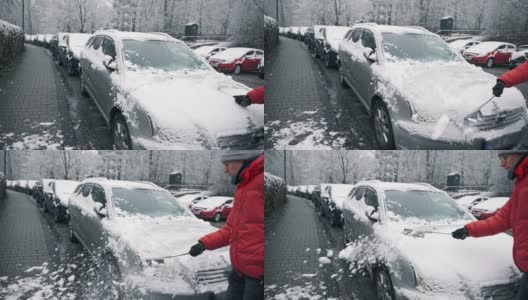 一个男人正在从他的车里移雪高清在线视频素材下载